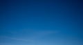 Clear Deep Blue Sky with Subtle Wisps of White Cloud Formation bright Royalty Free Stock Photo
