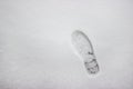 Clear deep footprints on white winter snow . Overhead view. Texture of snow surface. Human footprints in the snow. Natural winter Royalty Free Stock Photo