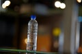 Clear Disposable Bottle on dark background