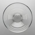 A clear, empty glass bowl viewed from above, showcasing its round shape and smoo Royalty Free Stock Photo