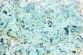 Clear gel texture. Light blue cosmetic jelly. Abstract pattern background