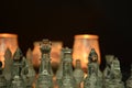 Clear glass chess pieces on a glass chessboard Royalty Free Stock Photo