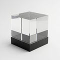 Clear Glass Cube Object with Black Base on White Background transparent geometric Royalty Free Stock Photo