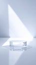 Clear Glass Cylinder Platform on Reflective Surface Royalty Free Stock Photo