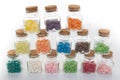 Clear glass jar of candy and colorful jelly beans spilled from jar Royalty Free Stock Photo