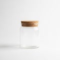 A clear glass jar with a cylindrical shape and a modern design Royalty Free Stock Photo