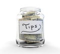 Clear Glass Jar for Tips with Coins and Bills Royalty Free Stock Photo