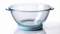 Clear Glass Mixing Bowl with Handles and Light Blue Base on White Background Royalty Free Stock Photo