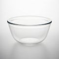 Clear glass mixing bowl on a white background Royalty Free Stock Photo