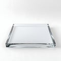Clear glass rectangular block on a white background with sharp edges Royalty Free Stock Photo