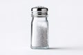 Clear glass salt shaker filled with coarse salt showcasing simple kitchen essentials on a white background Royalty Free Stock Photo