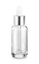 Clear glass serum bottle for cosmetic products design mock-up Royalty Free Stock Photo