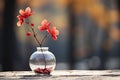 a clear glass vase with red flowers in it Royalty Free Stock Photo