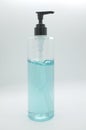 Clear hand sanitizer in a clear pump bottle isolated on a white background