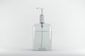 Clear hand sanitizer in pump bottle on white background