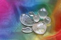 Clear healing crystals on rainbow chiffon Royalty Free Stock Photo