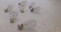 Clear lightbulbs over a rough surface Royalty Free Stock Photo