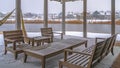 Clear Panorama Snowy patio of a clubhouse overlooking Oquirh Lake