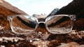 Clear perspective: mountains reflected in glasses with nature view Royalty Free Stock Photo