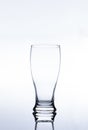 Clear Pilsner Glass on white background Royalty Free Stock Photo