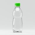 Clear plastic bottle with a green cap, standing upright on a plain background. The bot Royalty Free Stock Photo