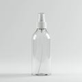 Clear plastic spray bottle with a white nozzle and a long tube extending inside. The Royalty Free Stock Photo