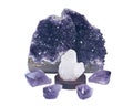 Clear quartz cluster surrounded by amethyst purple druse geode and amethyst points Royalty Free Stock Photo