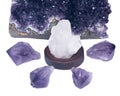 Clear quartz cluster surrounded by amethyst purple druse geode and amethyst points Royalty Free Stock Photo