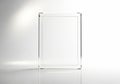 A clear rectangular glass plaque or award standing upright isolated on white background Royalty Free Stock Photo