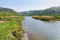 Clear rippled water of the River Dwyryd flowing across meadow Royalty Free Stock Photo