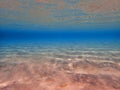 Clear sand under sea water Royalty Free Stock Photo