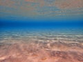 Clear sand under sea water