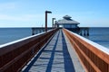 Clear skies over the fishing pier at Times Square in Fort Myers Beach. Royalty Free Stock Photo