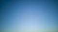 Clear sky without clouds,blue gradient from earth to troposphere on calm sunny day,evening.Horizontal banner.Copy space