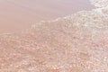 Clear soft wave of sea or ocean on sandy beach. Background Royalty Free Stock Photo
