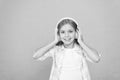 Clear sound. Girl child listen music with modern headphones. Kid little girl listen music headphones. Music account