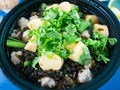 Clear Soup with Tofu, Seaweed, and Minced Pork, a popular dish in Thailand, can be found in street food stalls. It is a healthy