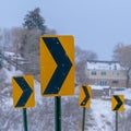 Clear Square Directional road signs on mountain road in winter Royalty Free Stock Photo