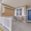 Clear Square Home exterior with a blue front door and reflective glass windows Royalty Free Stock Photo