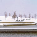 Clear Square Snowy deck and park at a lake in Daybreak Utah