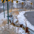 Clear Square Snowy road with directional road signs in winter Royalty Free Stock Photo