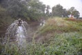 Clear sweet and health water overflowing from the water jet on rainy days