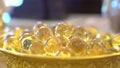 Clear transparence round glass acrylic plastic bubbles with light reflex inside in a yellow gold plate.