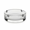 Clear Glass Ashtray with Four Notches on a White Background transparent crystal Royalty Free Stock Photo