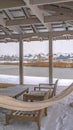 Clear Vertical Clubhouse overlooking Oquirrh Lake in winter day Royalty Free Stock Photo