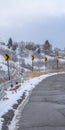 Clear Vertical Damaged mountain road with directional road signs Royalty Free Stock Photo