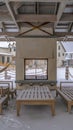 Clear Vertical Seating on the snowy patio of a clubhouse in Utah