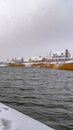 Clear Vertical Snowy lake shore with homes in Daybreak Utah Royalty Free Stock Photo