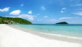 Clear water and blue sky on tropical sandy beach at summer sunny