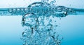 Clear Water Bubbles Splash in Blue Liquid Royalty Free Stock Photo